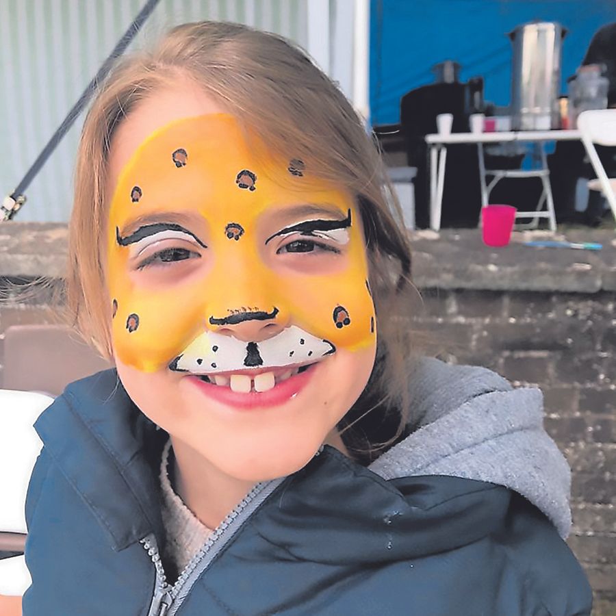 Face painting attracts youngsters to evangelical stall