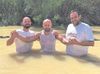 Three former addicts baptised in the Jordan