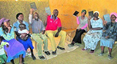 Believers with donated Bibles